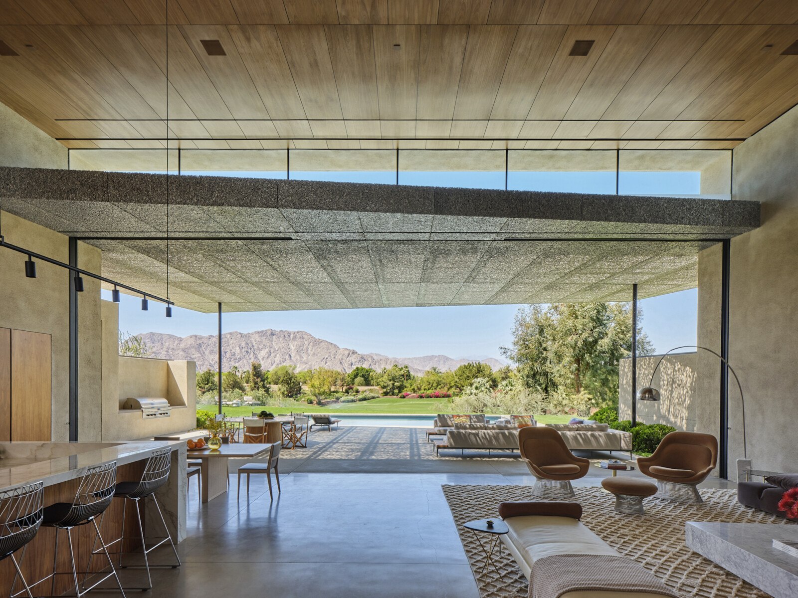 Madison Desert Club volume opens to view of mountains in the distance