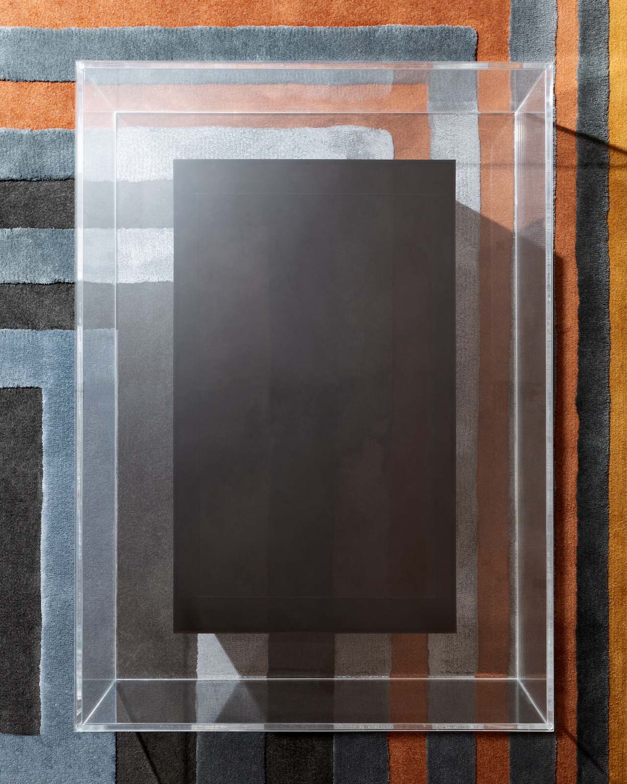 Echo Acrylic Coffee Table in living room from above, no decor